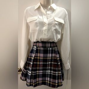 Plaid. Pleated skirt.